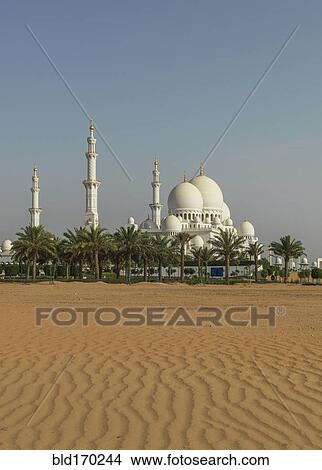Picture - Ornate domed building in desert sand dunes, Abu Dhabi, Abu Dhabi Emirate, United Arab Emirates. Fotosearch