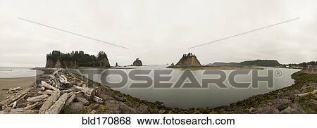 Stock Photo - Panoramic view of sea stacks on beach. Fotosearch
