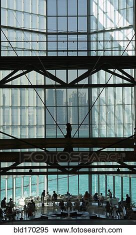 People in modern glass atrium, Doha, Doha, Qatar View Large Photo Image Stock Photography - People in modern glass atrium, Doha, Doha, Qatar. Fotosearch