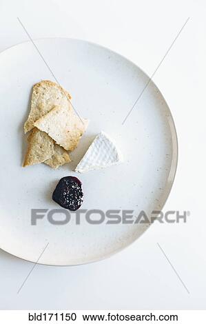 Plate of brie cheese, jam and crackers View Large Photo Image Stock Image - Plate of brie cheese, jam and crackers. Fotosearch