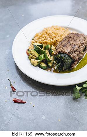 Plate of grilled pepper with vegetables and rice View Large Photo Image Stock Photo - Plate of grilled pepper with vegetables and rice. Fotosearch