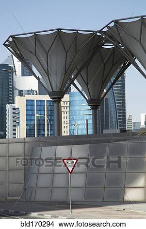 Roadsign under unique structures in Doha cityscape, Doha, Qatar View Large Photo Image Picture - Roadsign under unique structures in Doha cityscape, Doha, Qatar. Fotosearch