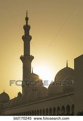Stock Photography - Silhouette of ornate domed building and spires, Abu Dhabi, Abu Dhabi Emirate, United Arab Emirates. Fotosearch