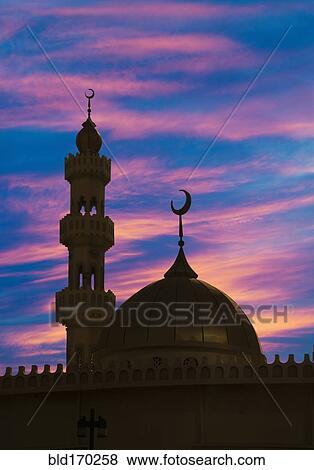 Silhouette of ornate spires and dome building, Abu Dhabi, Abu Dhabi Emirate, United Arab Emirates View Large Photo Image Stock Photo - Silhouette of ornate spires and dome building, Abu Dhabi, Abu Dhabi Emirate, United Arab Emirates. Fotosearch