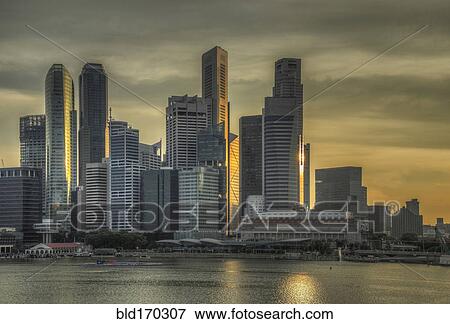 Stock Photo - Singapore city skyline and waterfront, Singapore, Singapore. Fotosearch