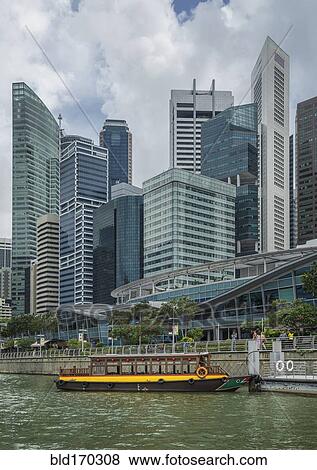 Stock Photo - Singapore city skyline and waterfront, Singapore, Singapore. Fotosearch