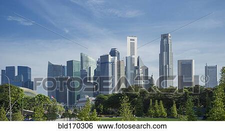 Stock Photograph - Singapore highrise buildings over urban park, Singapore, Singapore. Fotosearch