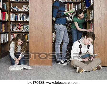 Students reading in library View Large Photo Image Stock Photo - Students reading in library. Fotosearch