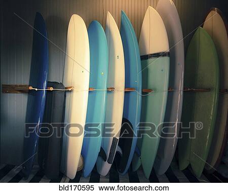 Surfboards standing in rack View Large Photo Image Stock Photography - Surfboards standing in rack. Fotosearch