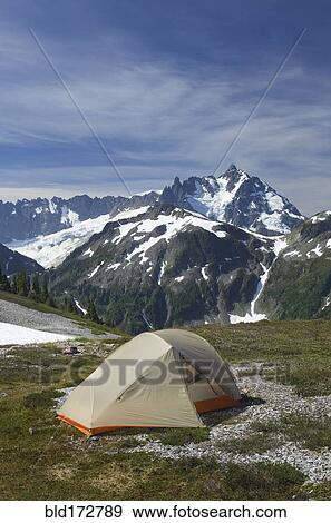 Tent at campsite in remote landscape View Large Photo Image Stock Photo - Tent at campsite in remote landscape. Fotosearch