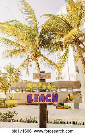 Stock Photograph - Tourist signs for tropical beach. Fotosearch
