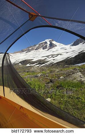 View from tent under snowy mountainside View Large Photo Image Stock Image - View from tent under snowy mountainside. Fotosearch