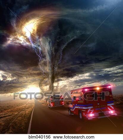 Stock Photograph - Ambulance driving to tornado in desert. Fotosearch