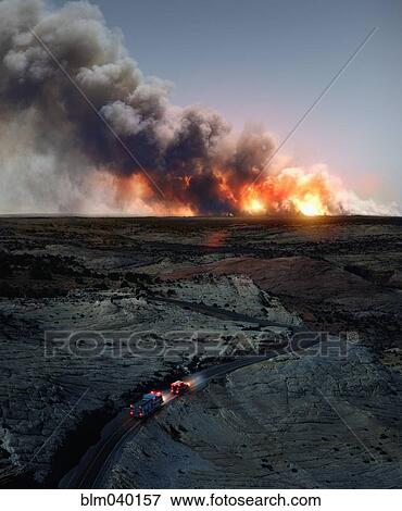 Ambulance driving to wildfire in desert View Large Photo Image Stock Photo - Ambulance driving to wildfire in desert. Fotosearch