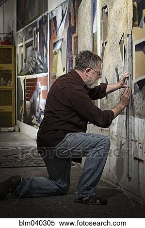 Caucasian artist drawing in studio View Large Photo Image Stock Photography - Caucasian artist drawing in studio. Fotosearch