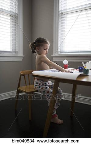 Picture - Caucasian girl finger painting. Fotosearch