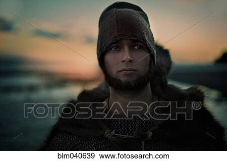Stock Photo - Caucasian man wearing hat and cape. Fotosearch