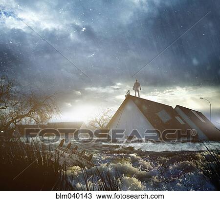Stock Image - Caucasian people standing on roof of flooded house. Fotosearch