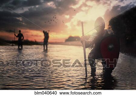 Caucasian soldiers standing in river View Large Photo Image Stock Image - Caucasian soldiers standing in river. Fotosearch