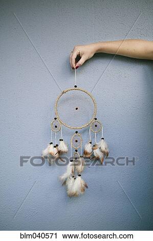 Hand holding dream catcher View Large Photo Image Stock Image - Hand holding dream catcher. Fotosearch
