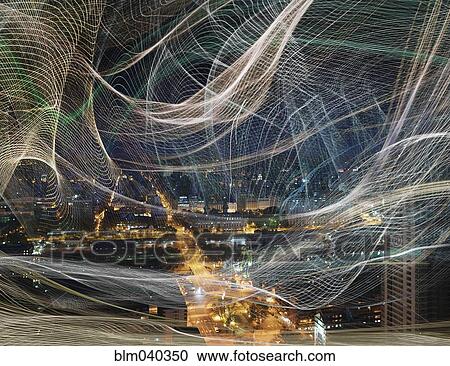 Light streams over cityscape at night View Large Photo Image Stock Image - Light streams over cityscape at night. Fotosearch