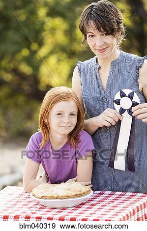 Mother and daughter winning pie baking contest View Large Photo Image Stock Photo - Mother and daughter winning pie baking contest. Fotosearch