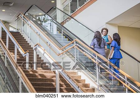 Nurses and doctor on hospital steps View Large Photo Image Stock Image - Nurses and doctor on hospital steps. Fotosearch