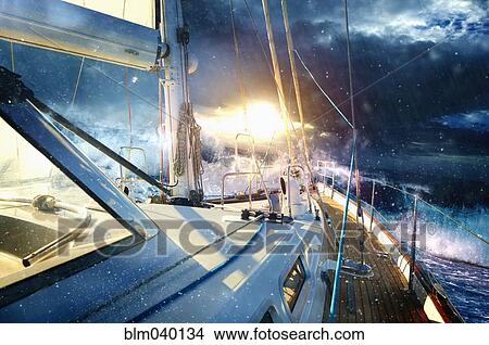Yacht sailing on stormy seas View Large Photo Image Picture - Yacht sailing on stormy seas. Fotosearch