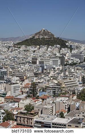 Stock Image - Aerial view of Athens cityscape and mountain, Attica, Greece. Fotosearch