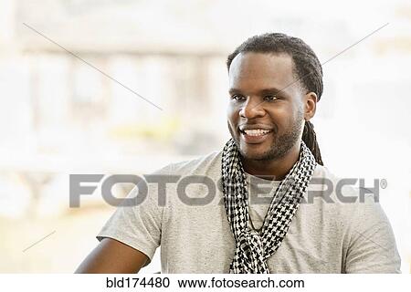 African American man smiling indoors View Large Photo Image Stock Image - African American man smiling indoors. Fotosearch