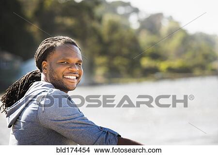 African American man smiling outdoors View Large Photo Image Picture - African American man smiling outdoors. Fotosearch