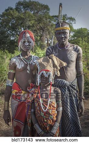 Black father and teenage children in traditional clothing View Large Photo Image Stock Image - Black father and teenage children in traditional clothing. Fotosearch