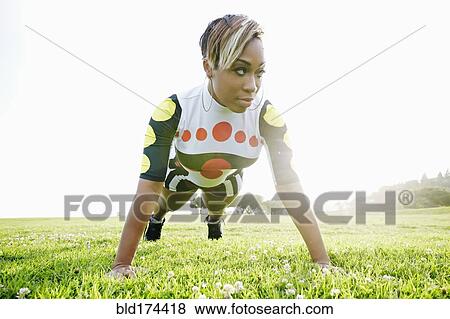 Black woman doing push View Large Photo Image Stock Photo - Black woman doing push. Fotosearch