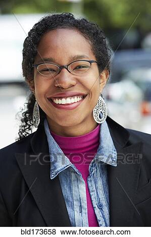 Stock Photo - Black woman smiling. Fotosearch