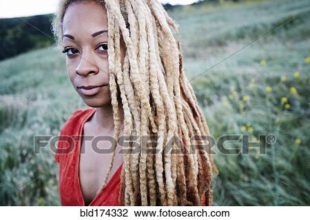 Black woman walking in field View Large Photo Image Stock Image - Black woman walking in field. Fotosearch