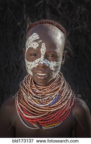 Stock Photo - Black woman wearing traditional jewelry. Fotosearch