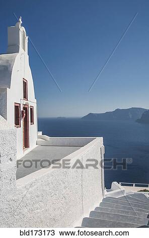 Building on hillside over seascape View Large Photo Image Stock Image - Building on hillside over seascape. Fotosearch