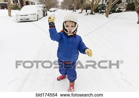 Caucasian boy throwing snowball View Large Photo Image Picture - Caucasian boy throwing snowball. Fotosearch