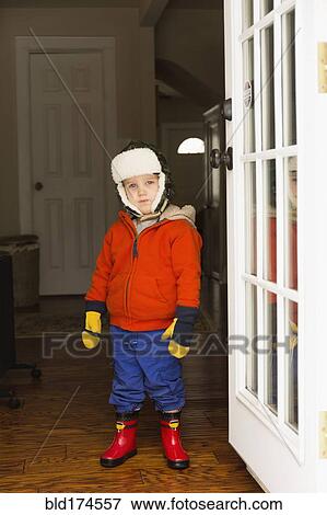Stock Photo - Caucasian boy wearing snow gear. Fotosearch