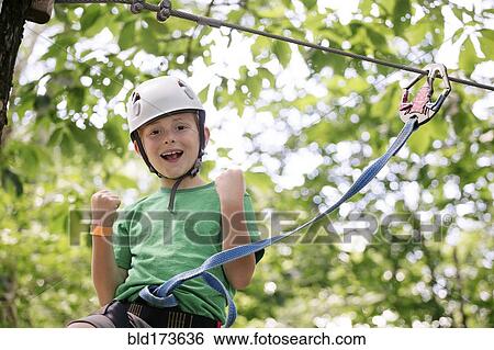 Stock Photograph - Caucasian boy zip. Fotosearch