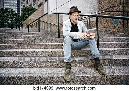 Caucasian businessman using digital tablet View Large Photo Image Stock Image - Caucasian businessman using digital tablet. Fotosearch