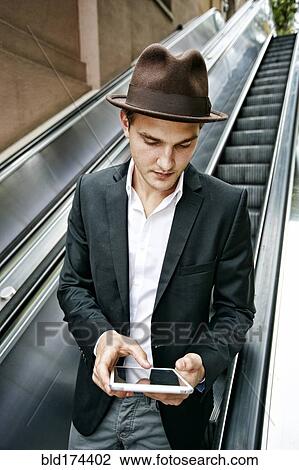 Caucasian businessman using digital tablet View Large Photo Image Stock Image - Caucasian businessman using digital tablet. Fotosearch