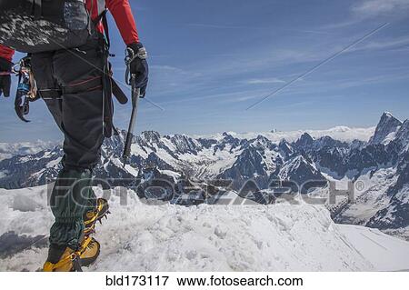 Caucasian hiker on mountaintop, Mont Blanc, Chamonix, France View Large Photo Image Stock Photo - Caucasian hiker on mountaintop, Mont Blanc, Chamonix, France. Fotosearch