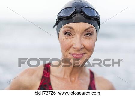 Caucasian swimmer smiling View Large Photo Image Stock Photograph - Caucasian swimmer smiling. Fotosearch