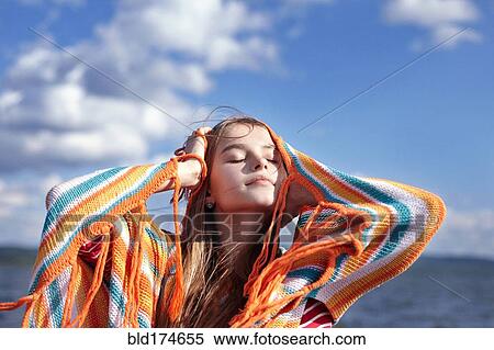 Caucasian teenage girl smiling with shawl View Large Photo Image Stock Photography - Caucasian teenage girl smiling with shawl. Fotosearch