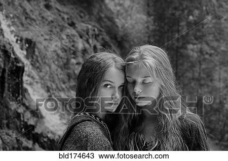 Caucasian teenage girls in forest View Large Photo Image Stock Image - Caucasian teenage girls in forest. Fotosearch