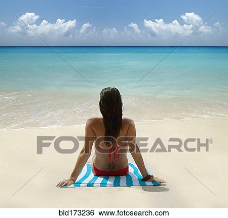 Caucasian woman laying on tropical beach View Large Photo Image Stock Photograph - Caucasian woman laying on tropical beach. Fotosearch