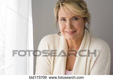 Caucasian woman smiling View Large Photo Image Stock Photo - Caucasian woman smiling. Fotosearch