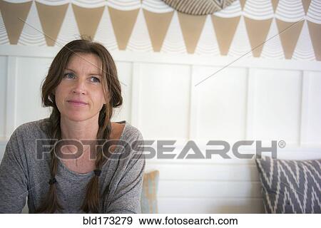 Caucasian woman wearing braids View Large Photo Image Stock Photo - Caucasian woman wearing braids. Fotosearch