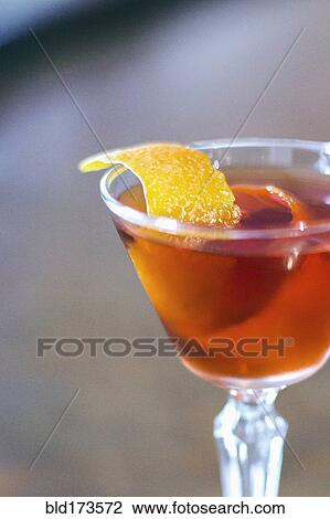Close up of lemon peel in cocktail View Large Photo Image Stock Image - Close up of lemon peel in cocktail. Fotosearch